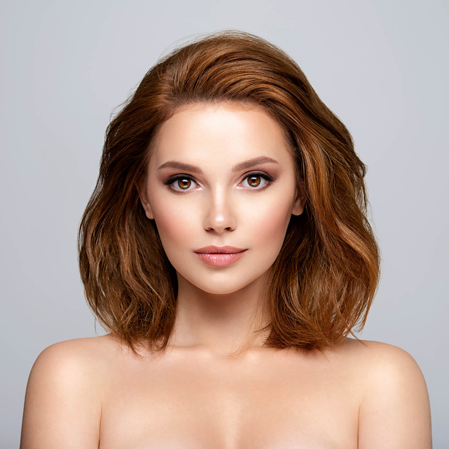 Portrait-of-a-beautiful-woman-with-a-long-brown-hair.jpg